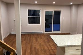 Mississauga apartment for rent - Waterford Townhouses in Mississauga, ON spacious living room with access to backyard
