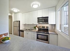 Whitby apartment for rent - Whitby Place in Whitby, ON kitchen includes stainless steel appliances