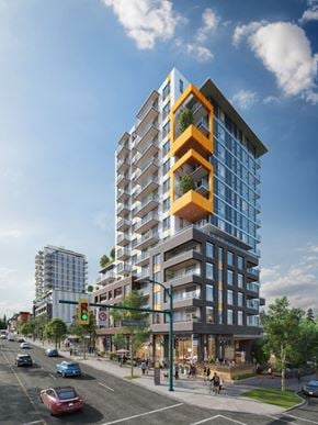 Vancouver apartment for rent - A modern multi-story building with balconies and plants on the balconies is situated on a street corner with cars and traffic lights.