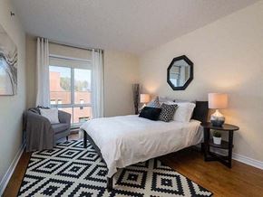 Montreal apartment for rent - Excelsior Apartments master bedroom with hardwood flooring in Montreal, QC