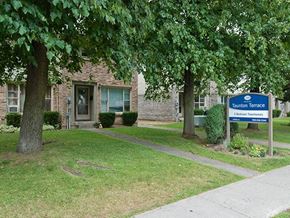 Oshawa apartment for rent - Taunton Terrace in Oshawa, ON exterior of property with monument sign