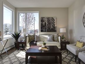 Airdrie apartment for rent - Airdrie Place in Airdrie, AB Generous size living room with ample natural lighting