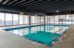 Edmonton apartment for rent - Efficiently designed swimming pools available at 99 Jasper in Edmonton, AB