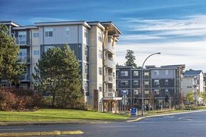 Nanaimo apartment for rent - Apartment building with a street in front of it.