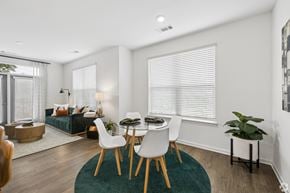 Nashville apartment for rent - A dining room with a table and chairs.