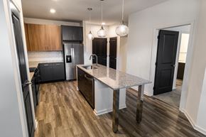 Nashville apartment for rent - a renovated kitchen with a marble counter top in a new home
