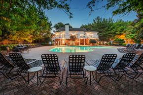 Woodstock apartment for rent - evening pool exterior and clubhouse