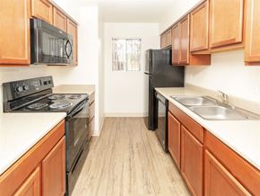Tucson apartment for rent - Modern Kitchen With Custom Cabinet at Cimarron Place Apartments, Tucson, AZ, 85712