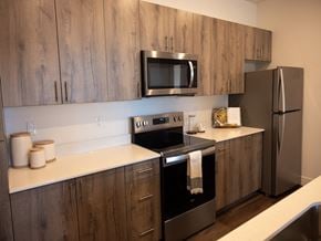 Cheyenne apartment for rent - Brown Cabinets in Kitchen at Ridge View