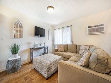 Mesa apartment for rent - a living room with a couch and a television
