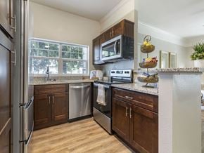 Midvale apartment for rent - Kitchen with Steel Appliances at Pinehurst Apartments Midvale, UT 84047