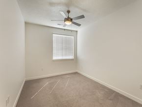American Fork townhouse for rent - Large Bedroom with Ceiling Fan at The Sage Apartments