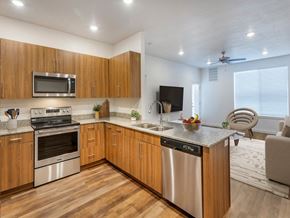 Logan apartment for rent - Kitchen with Steel Appliances at Meadows at Homestead Logan, UT 84321