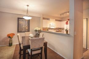 Renton apartment for rent - Dining Room and Kitchen View at Metropolitan Place Apartments, Renton, Washington