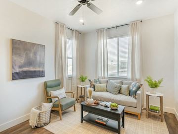 Idaho Falls apartment for rent - a living room with a couch and a ceiling fan