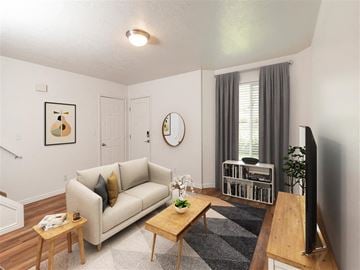 North Logan townhouse for rent - a living room with a couch and a tv