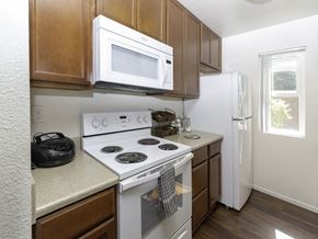Chula Vista apartment for rent - White Appliances in Kitchen at Eucalyptus Grove Apartments, Chula Vista, CA, 91910