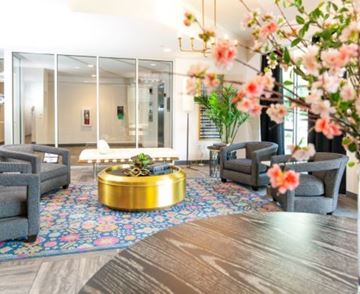 Salt Lake City apartment for rent - a living room with a table and chairs and flowers