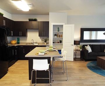 Salt Lake City apartment for rent - a kitchen and living room with a table and chairs