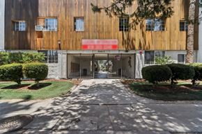 Winnetka apartment for rent - The image shows a building with a red sign that reads "EXIT" in front of it.