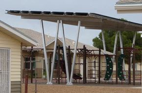 Douglas apartment for rent - a playground with a swing set and climbing equipment