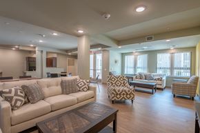 Richmond apartment for rent - A living room with a couch, chairs, and a coffee table.