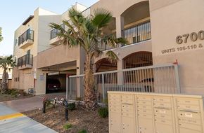 Huntington Park apartment for rent - A building with the number 6700 on it and a row of mailboxes in front.