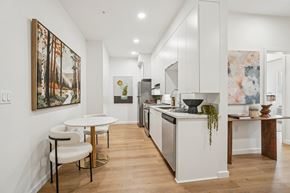 Los Angeles apartment for rent - A modern kitchen with a dining table and chairs.