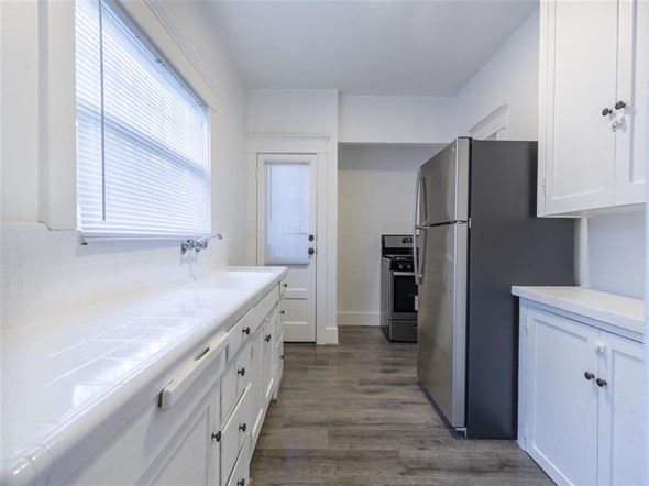 Long Beach apartment for rent - Kitchen view with stainless steel fridge