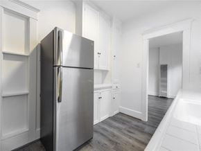 Long Beach apartment for rent - Kitchen view with stainless steel fridge