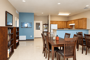 Douglas apartment for rent - A dining room with a wooden table and chairs.