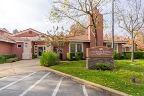 Sacramento apartment for rent - The image shows the front of a building named Creekside Village.