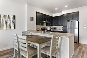 Morgan Hill apartment for rent - a kitchen and dining room with a table and chairs