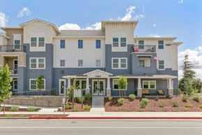 Morgan Hill apartment for rent - a large apartment building on the side of a street