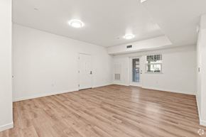 Gilroy apartment for rent - an empty living room with white walls and wood floors