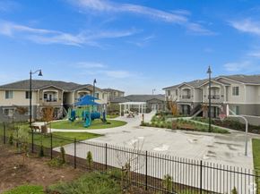 Gilroy apartment for rent - a playground is in the middle of an empty park