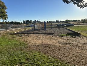 Fairfield apartment for rent - A construction site with a fence and a few trees in the background.