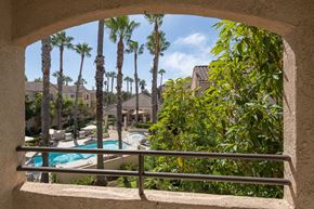 Redondo Beach apartment for rent - A pool is seen through a window.