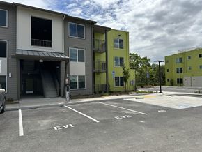 Santa Rosa apartment for rent - A parking lot with the letters EV1 and EV2 painted on the pavement.