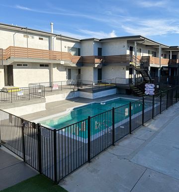Winnetka apartment for rent - A black fence surrounds a small pool.