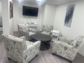 American Canyon apartment for rent - A living room with a TV and chairs.