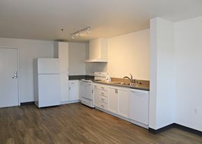 Santa Rosa apartment for rent - A kitchen with white appliances and cabinets.