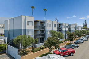 Monrovia apartment for rent - A row of modern houses with trees in front.