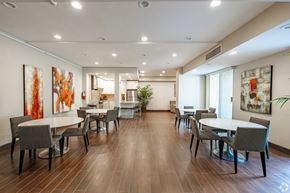 Monrovia apartment for rent - A dining room with a long table and chairs at Oak Park Apartments, Monrovia, 91016