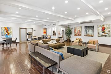 Monrovia apartment for rent - A living room with a grey couch and a coffee table.