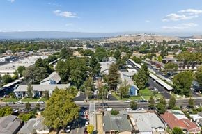 San Jose apartment for rent - A view of a residential area with houses and trees.