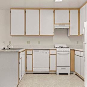 Inglewood apartment for rent - a kitchen with a stove top oven next to a sink