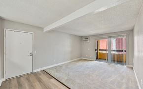 West Covina apartment for rent - the spacious living room with sliding glass doors to the balcony at Brookhollow Apartments, California, 91792