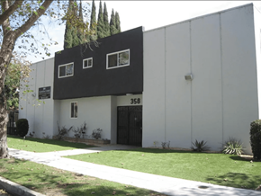 Burbank apartment for rent - A white building with black trim and windows is numbered 358.