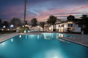 Palmdale apartment for rent - A swimming pool at a residential area during twilight at Chaparral Apartments , California